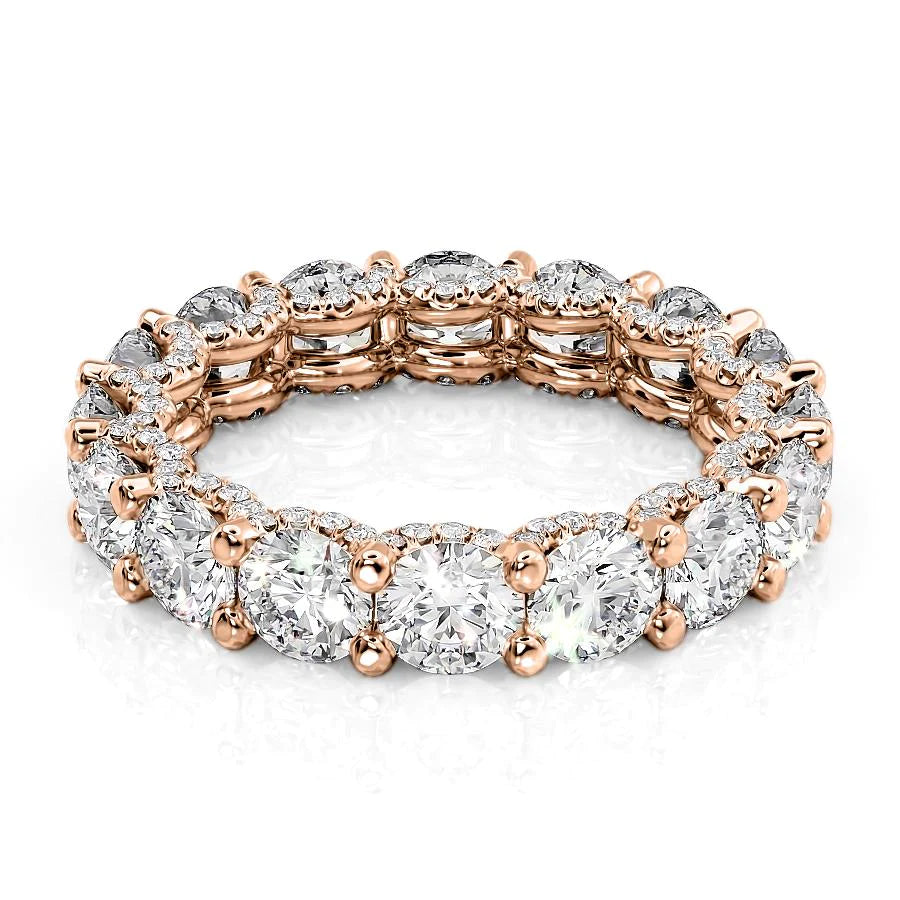 4.8ct Round U Pave Prong Eternity. A Rose Gold Eternity Ring Set With 4.8tcw Round Lab Grown Diamonds. White Background.