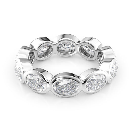 4ct East West Oval Bezel Eternity. A White Gold Eternity Ring Set With 4tcw Oval Lab Grown Diamonds. White Background.
