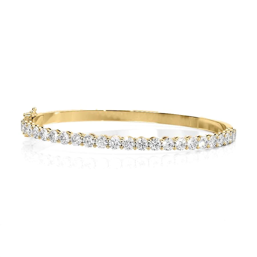 4ct Eternity Bangle. A Yellow Gold Bangle Bracelet Set With 4tcw Round Lab Grown Diamonds. White Background.