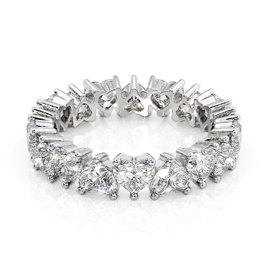 4ct Heart Eternity. A White Gold Eternity Ring Set With 4tcw Heart Lab Grown Diamonds. White Background.