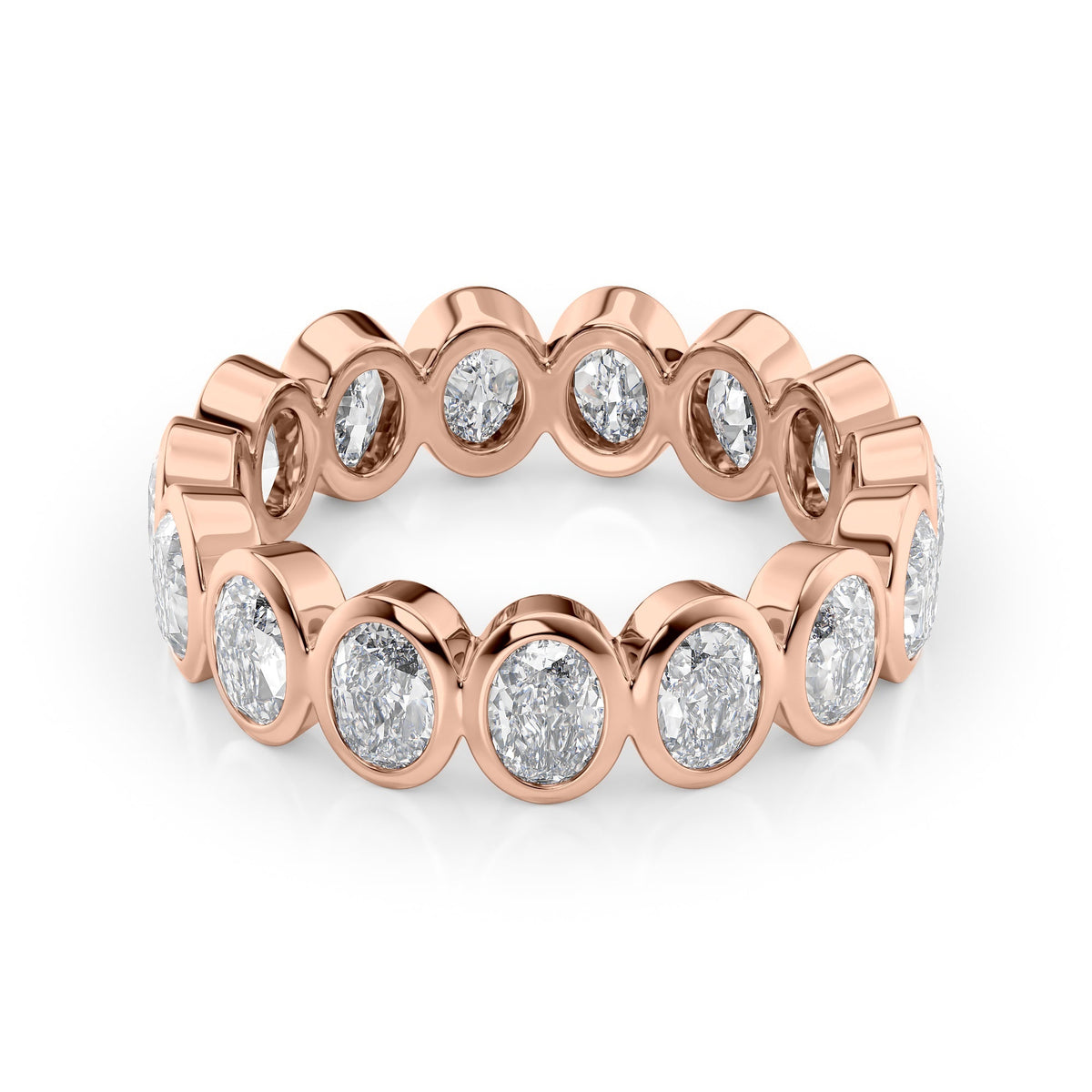 4ct Oval Bezel Eternity. A Rose Gold Eternity Ring Set With 4tcw Oval Lab Grown Diamonds. White Background.