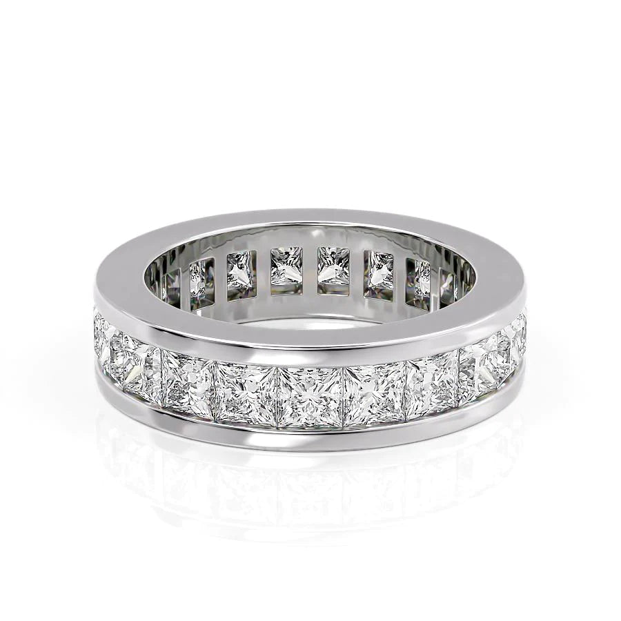 4ct Princess Channel Eternity. A White Gold Eternity Ring Set With 4tcw Princess Lab Grown Diamonds. White Background.