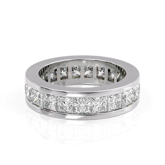 4ct Princess Channel Eternity. A White Gold Eternity Ring Set With 4tcw Princess Lab Grown Diamonds. White Background.