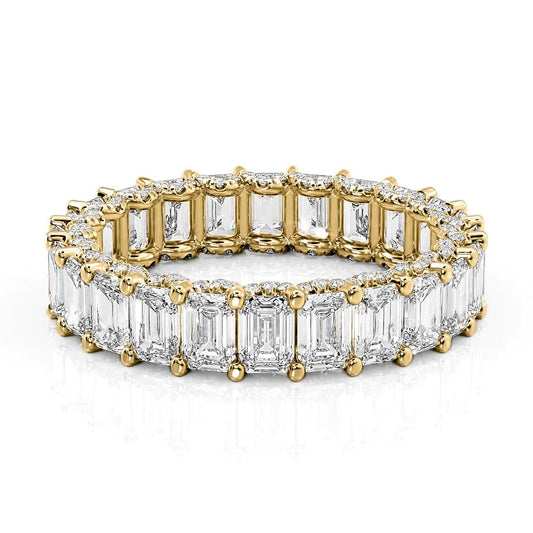 5.3ct Emerald U Pave Prong Eternity. A Yellow Gold Eternity Ring Set With 5tcw Emerald Lab Grown Diamonds. White Background.