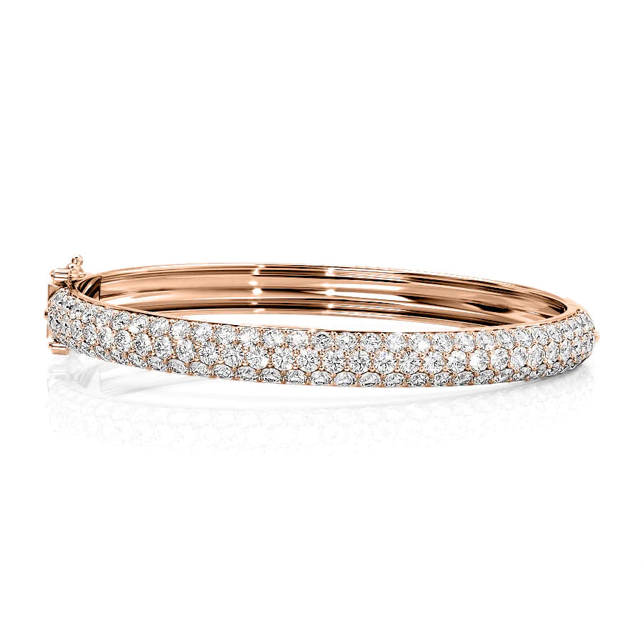 5.5ct 3 Row Bombe Bangle. A Rose Gold Bangle Bracelet Set With 5.5tcw Round Lab Grown Diamonds. White Background.