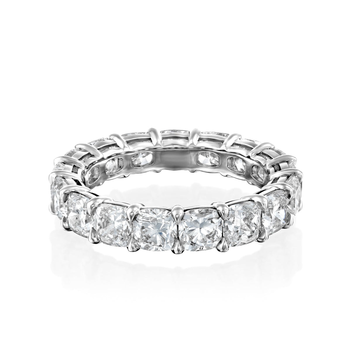 5ct Cushion Eternity. A White Gold Eternity Ring Set With 5tcw Cushion Lab Grown Diamonds. White Background.
