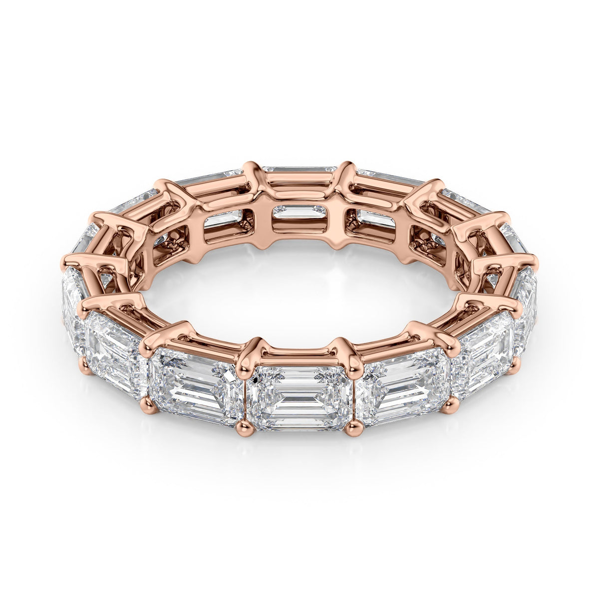 5ct East West Emerald Eternity. A Rose Gold Eternity Ring Set With 5tcw Emerald Lab Grown Diamonds. White Background.