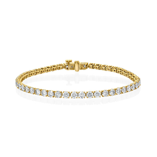 5ct Round Tennis Bracelet. A Yellow Gold Tennis Bracelet Set With 5tcw Round Lab Grown Diamonds. White Background.