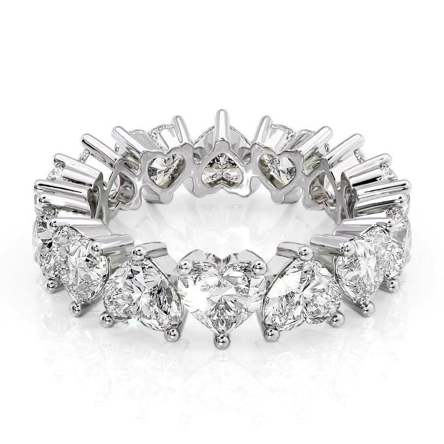 6.5ct Heart Eternity. A White Gold Eternity Ring Set With 6.5tcw Heart Lab Grown Diamonds. White Background.
