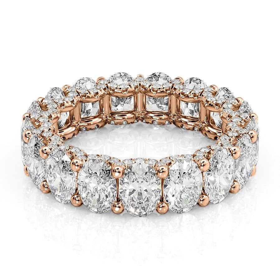 6.8ct Oval U Pave Prong Eternity. A Rose Gold Eternity Ring Set With 6.5tcw Oval Lab Grown Diamonds. White Background.