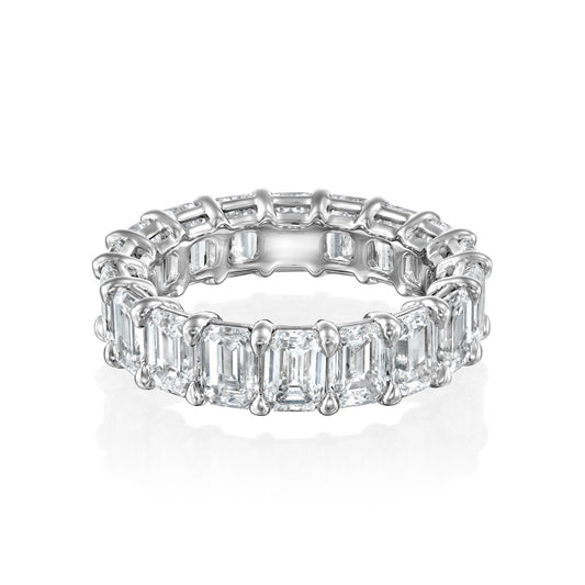 7.5ct Emerald Eternity. A White Gold Eternity Ring Set With 7.5tcw Emerald Lab Grown Diamonds. White Background.