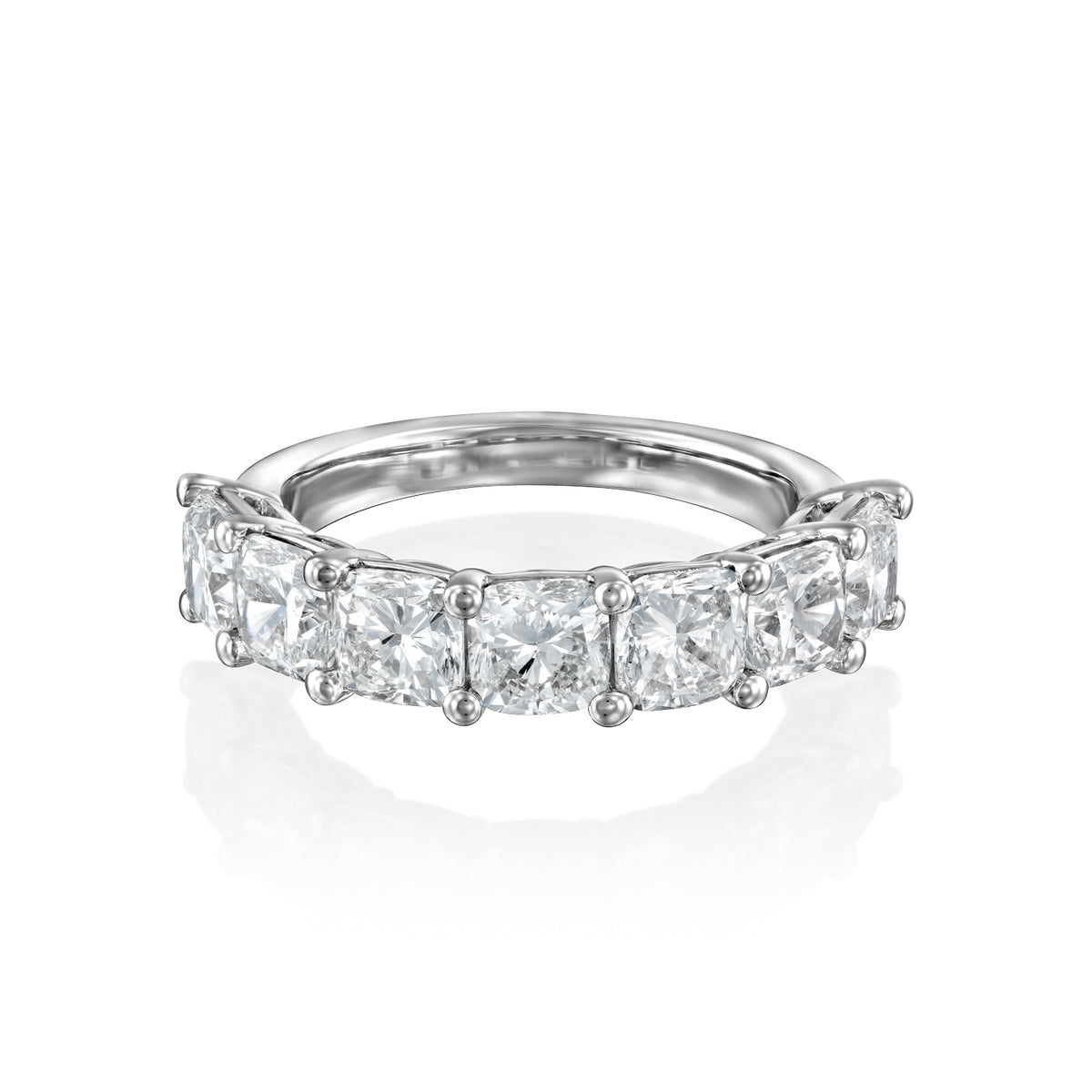 7 Stone 3ct Cushion Anniversary. A White Gold Anniversary Ring Set With 3tcw Cushion Lab Grown Diamonds. White Background.