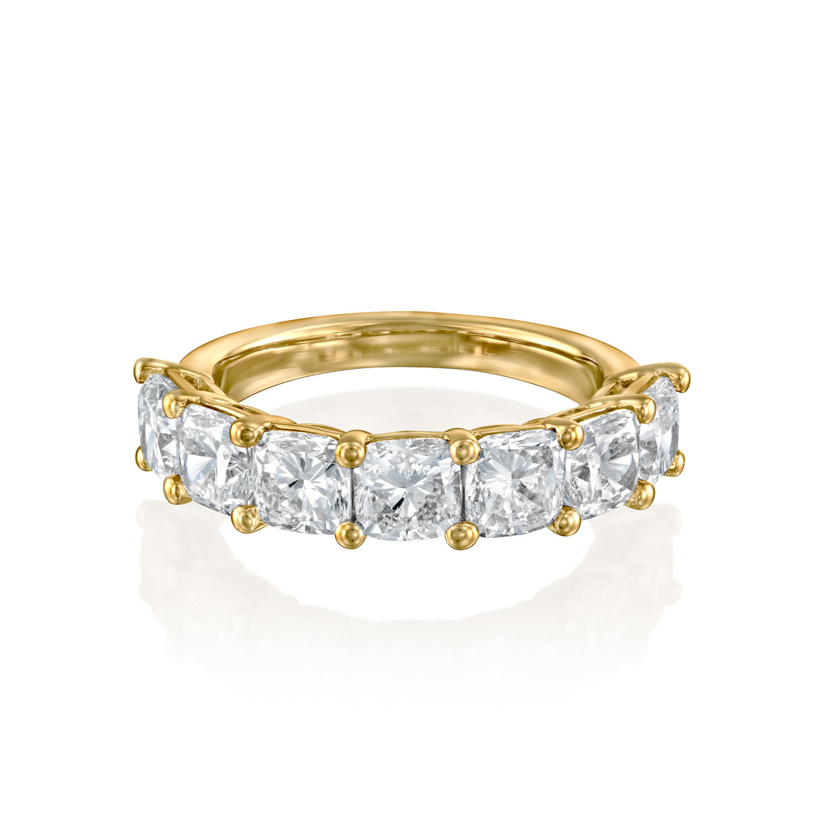 7 Stone 3ct Cushion Anniversary. A Yellow Gold Anniversary Ring Set With 3tcw Cushion Lab Grown Diamonds. White Background.