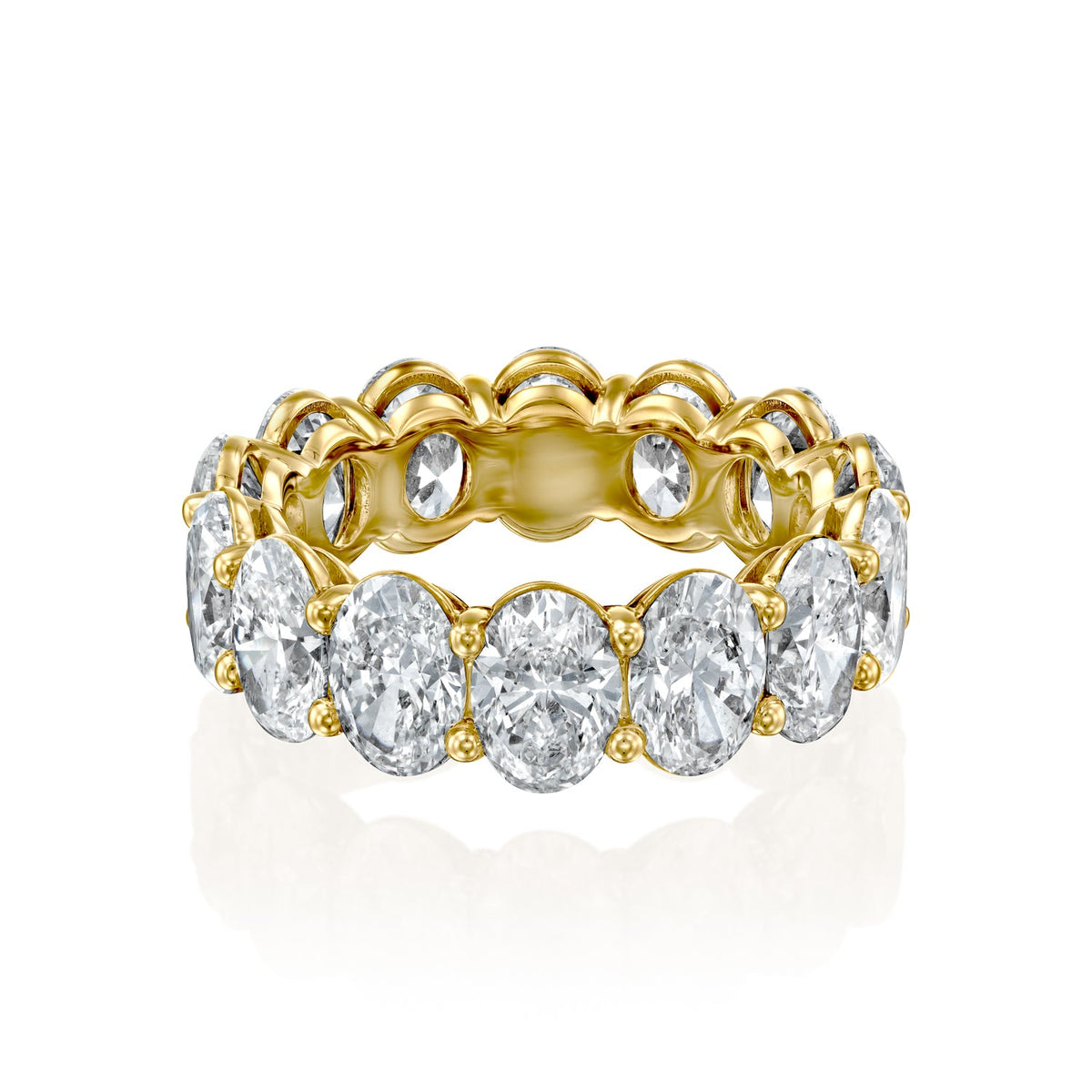 7ct Oval Eternity. A Yellow Gold Eternity Ring Set With 7tcw Oval Lab Grown Diamonds. White Background.