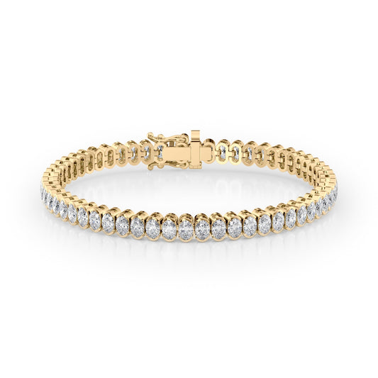 8ct Bezel Oval Tennis Bracelet. A Yellow Gold Tennis Bracelet Set With 8tcw Oval Lab Grown Diamonds. White Background.