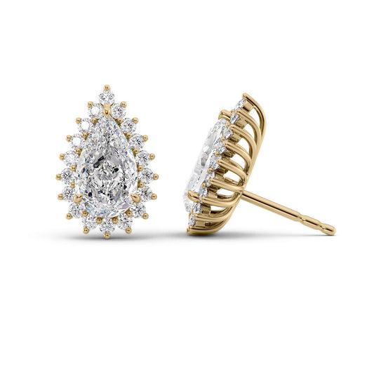 Accent Stone Stud Earrings Set With Pear Lab Diamonds. A Yellow Gold Accent Stones Diamond Stud Earrings Set With A 1ct Princess Lab Diamond. White Background.