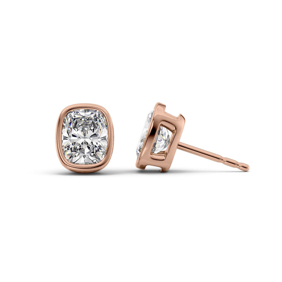 Bezel Stud Earrings Set With Elongated Cushion Lab Diamonds. A Rose Gold Diamond Stud Earrings Set With A 5ct Elongated Cushion Lab Diamond. White Background.