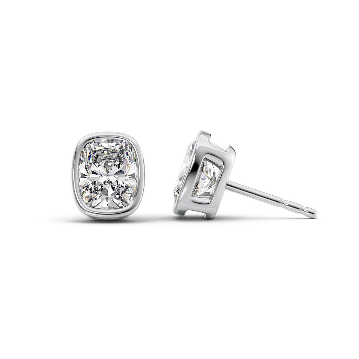 Bezel Stud Earrings Set With Elongated Cushion Lab Diamonds. A White Gold Diamond Stud Earrings Set With A 2ct Elongated Cushion Lab Diamond. White Background.