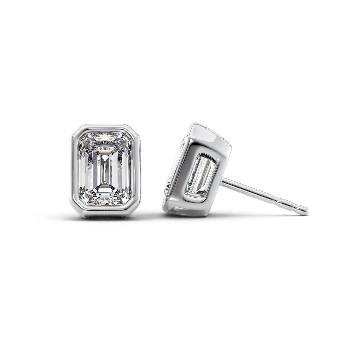 Bezel Stud Earrings Set With Emerald Lab Diamonds. A White Gold Diamond Stud Earrings Set With 3tcw Emerald Lab Diamonds (1.5ct Each). White Background.