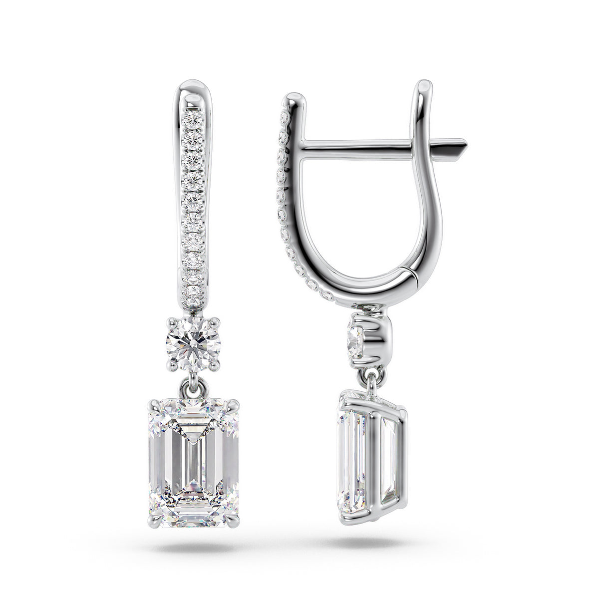 Diamond Drop Earrings Set With Emerald Lab Diamonds. A White Gold Diamond Drop Earrings Set With 3tcw Emerald Lab Diamonds (1.5ct Each). White Background.