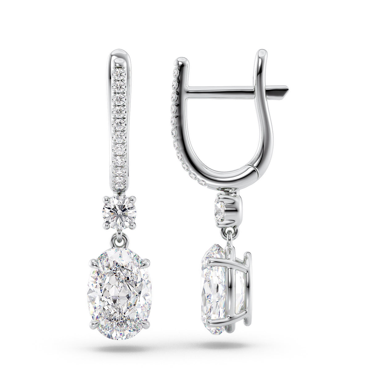 Diamond Drop Earrings Set With Oval Lab Diamonds. A White Gold Diamond Drop Earrings Set With 3tcw Oval Lab Diamonds (1.5ct Each). White Background.