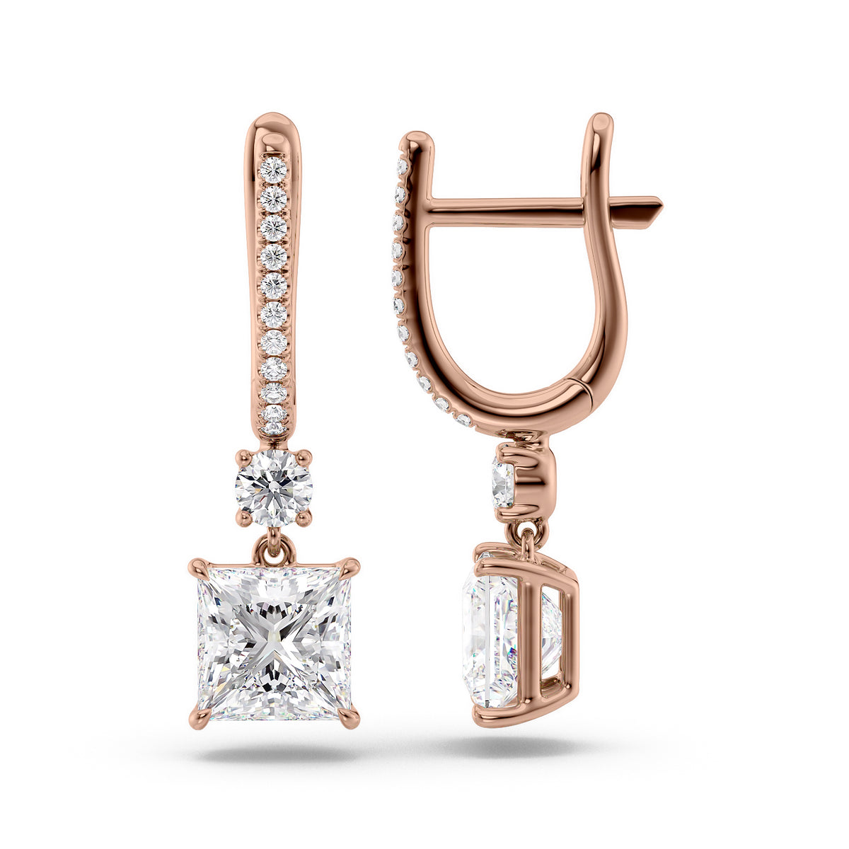 Diamond Drop Earrings Set With Princess Lab Diamonds. A Rose Gold Diamond Drop Earrings Set With A 1ct Pear Lab Diamond. White Background.