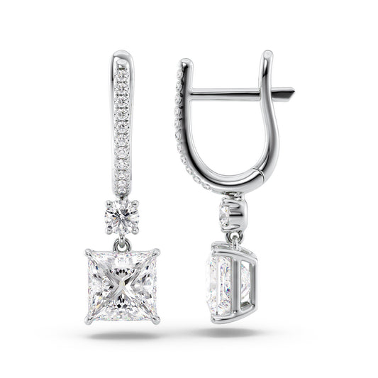 Diamond Drop Earrings Set With Princess Lab Diamonds. A White Gold Diamond Drop Earrings Set With A 1ct Pear Lab Diamond. White Background.