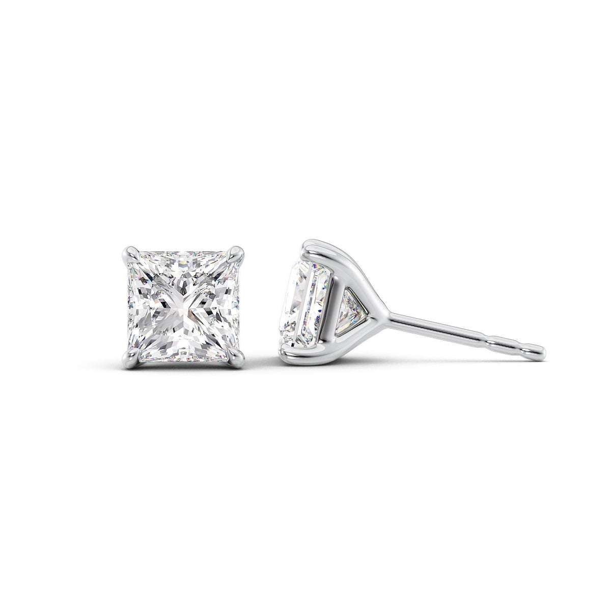 Stud Earrings Set With Princess Lab Diamonds. A White Gold Diamond Stud Earrings Set With A 2ct Pear Lab Diamond. White Background.