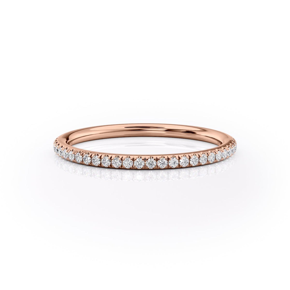 The 1.5mm Helen. A Rose Gold Pave Wedding Band Set With 0.15tcw Round Lab Grown Diamonds. White Background.