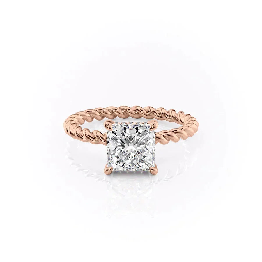 The Alice. A Rose Gold Solitaire, Hidden Halo Engagement Ring Set With A 2ct Princess Lab Grown Diamond. White Background.