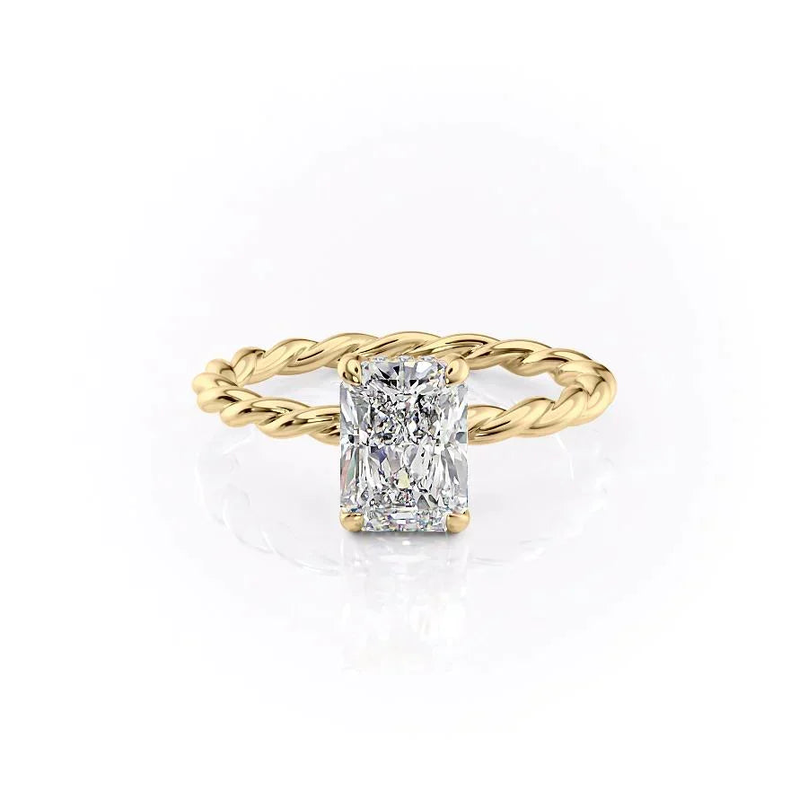 The Alice. A Yellow Gold Solitaire, Hidden Halo Engagement Ring Set With A 2ct Radiant Lab Grown Diamond. White Background.