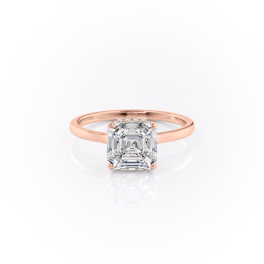 The Aline. A Rose Gold Solitaire, Hidden Halo Engagement Ring Set With A 2ct Asscher Lab Grown Diamond. White Background.
