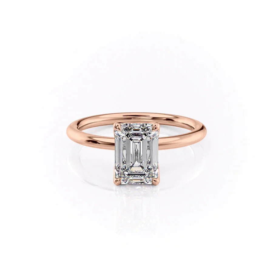 The Alison. A Rose Gold Solitaire Engagement Ring Set With A 2ct Emerald Lab Grown Diamond. White Background.