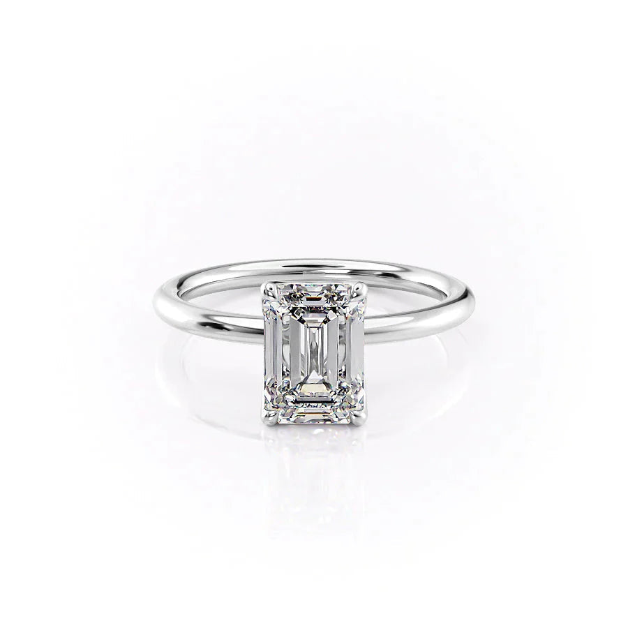 The Alison. A White Gold Solitaire Engagement Ring Set With A 2ct Emerald Lab Grown Diamond. White Background.