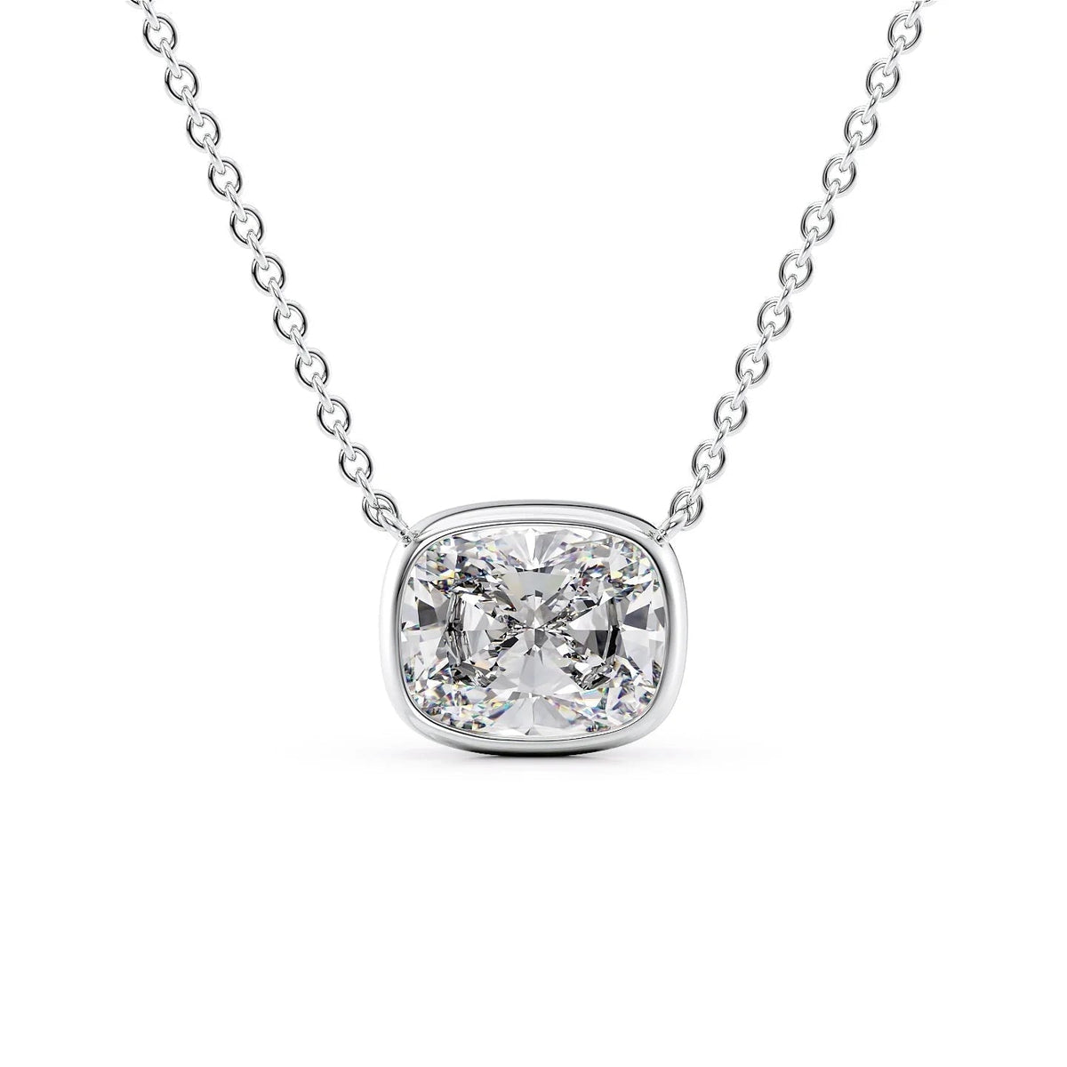 The Amelia. A White Gold Pendant Set With A 2ct Elongated Cushion Lab Grown Diamond. White Background.