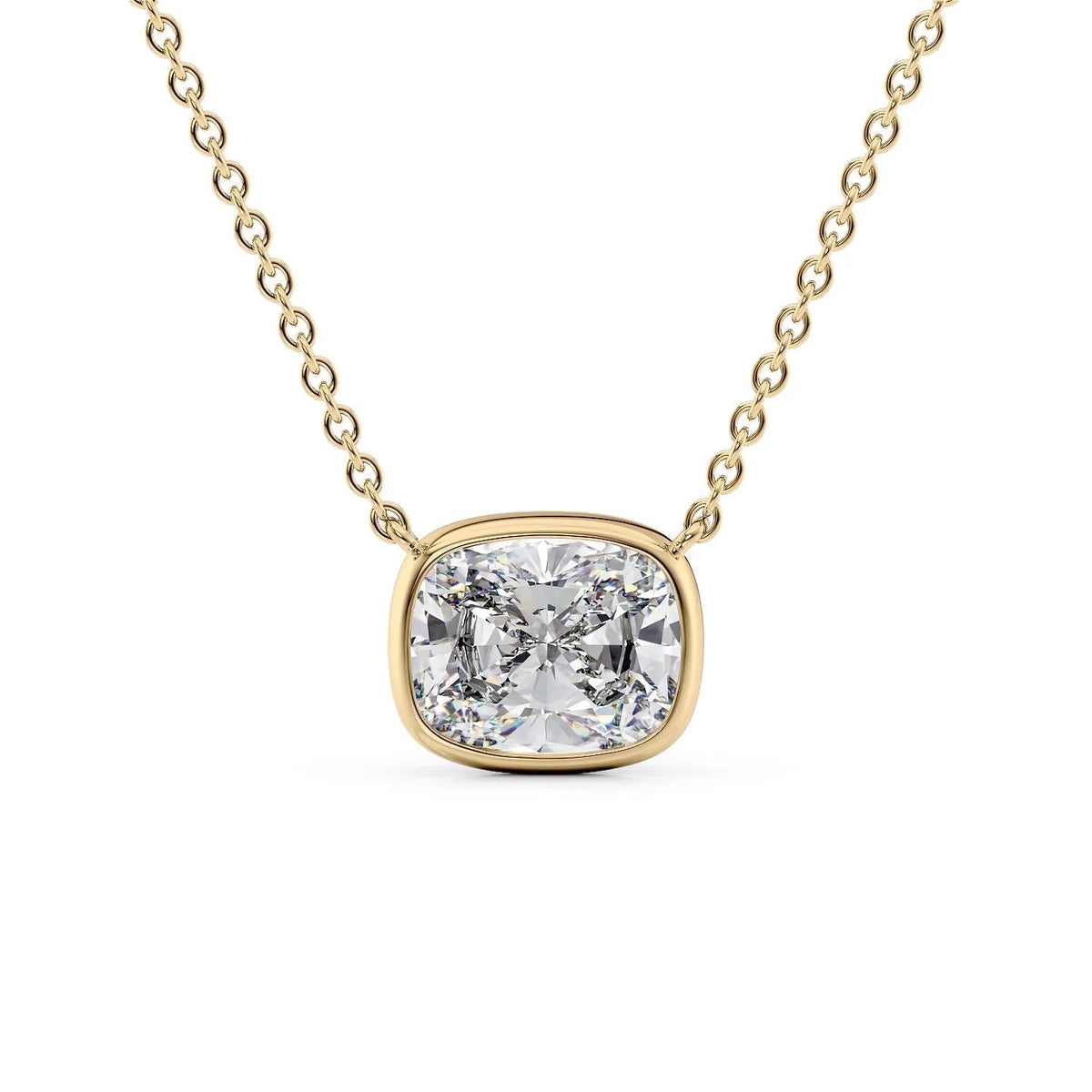 The Amelia. A Yellow Gold Pendant Set With A 2ct Elongated Cushion Lab Grown Diamond. White Background.