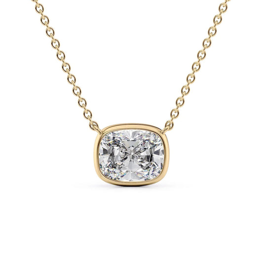 The Amelia. A Yellow Gold Pendant Set With A 2ct Elongated Cushion Lab Grown Diamond. White Background.
