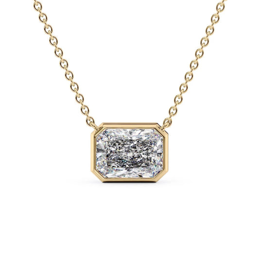 The Amelia. A Yellow Gold Pendant Set With A 2ct Radiant Lab Grown Diamond. White Background.