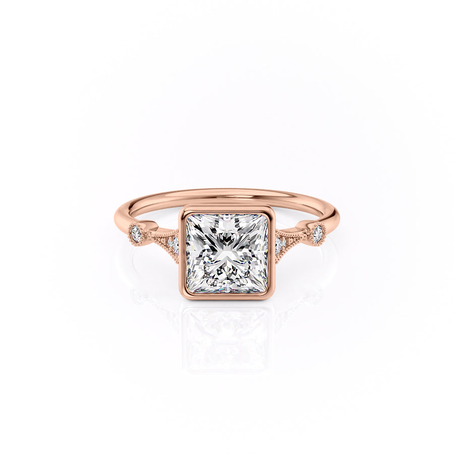 The Bezel Amber. A Rose Gold Vintage, Side Stones Engagement Ring Set With A 2ct Princess Lab Grown Diamond. White Background.