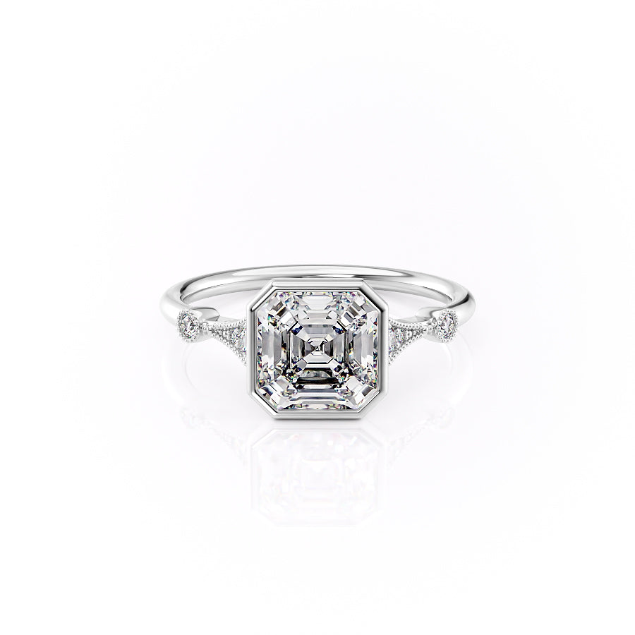 The Bezel Amber. A White Gold Vintage, Side Stones Engagement Ring Set With A 2ct Asscher Lab Grown Diamond. White Background.