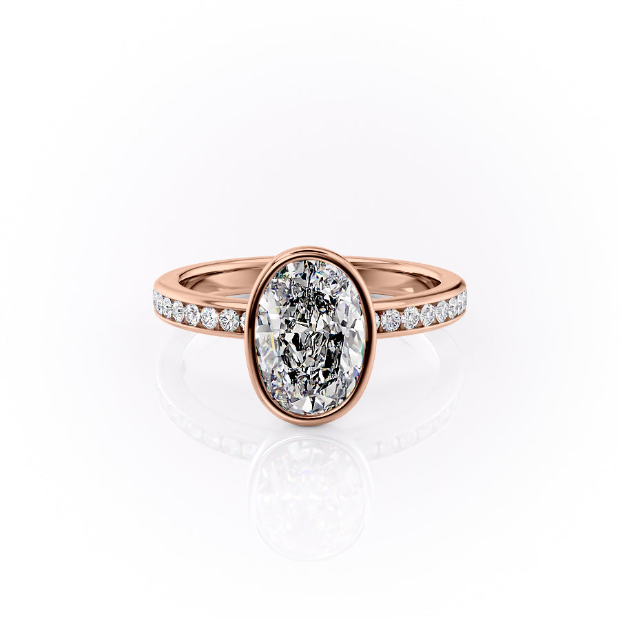 The Bezel Marilyn. A Rose Gold Channel-Set, Side Stones Engagement Ring Set With A 2ct Oval Lab Grown Diamond. White Background.