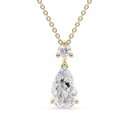 The Billie. A Yellow Gold Pendant Set With A 2ct Pear Lab Grown Diamond. White Background.