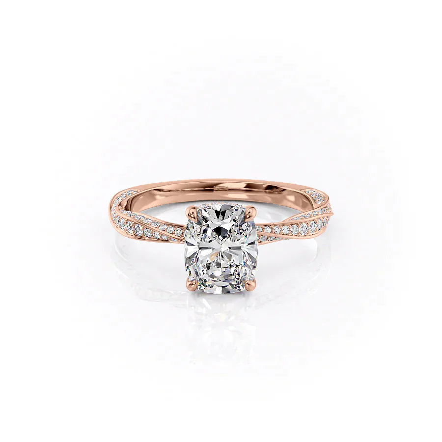 The Caroline. A Rose Gold Pave, Hidden Halo Engagement Ring Set With A 2ct Elongated Cushion Lab Grown Diamond. White Background.