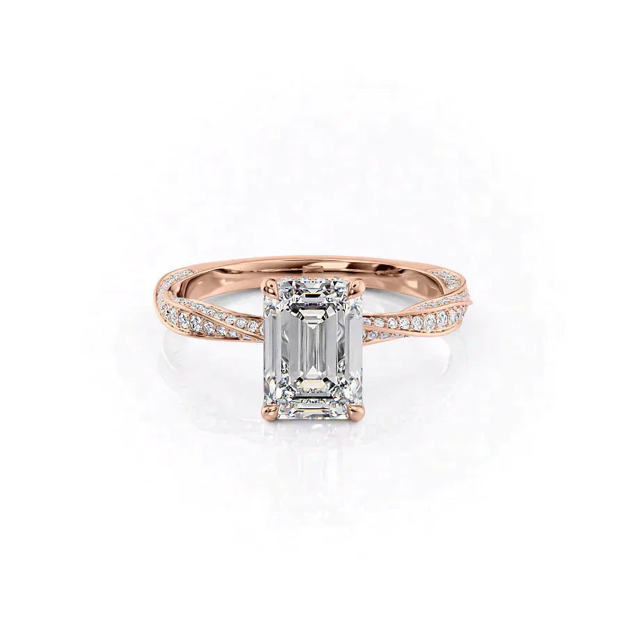 The Caroline. A Rose Gold Pave, Hidden Halo Engagement Ring Set With A 2ct Emerald Lab Grown Diamond. White Background.