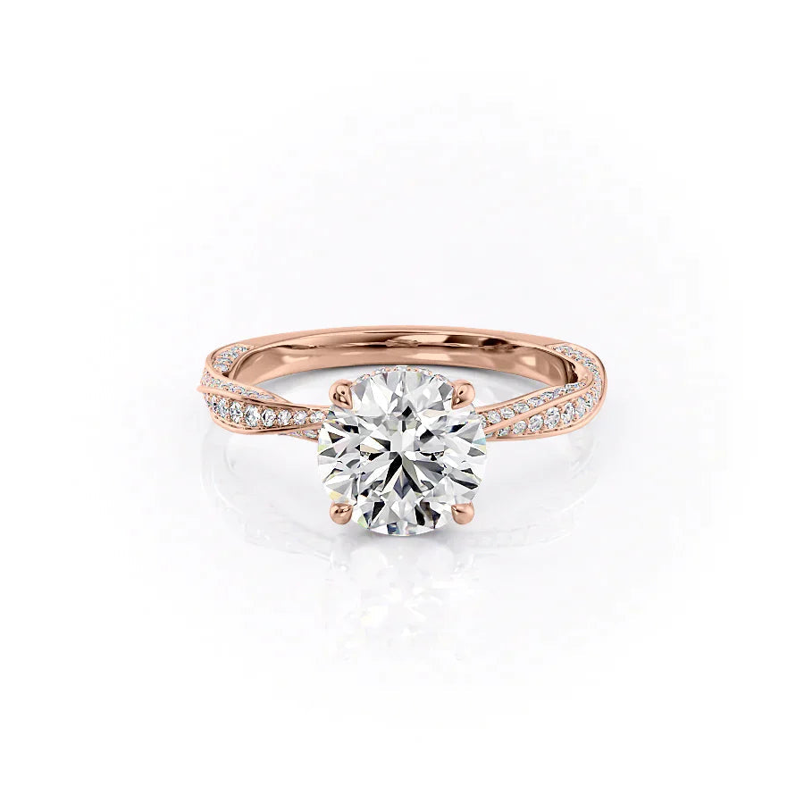The Caroline. A Rose Gold Pave, Hidden Halo Engagement Ring Set With A 2ct Round Lab Grown Diamond. White Background.