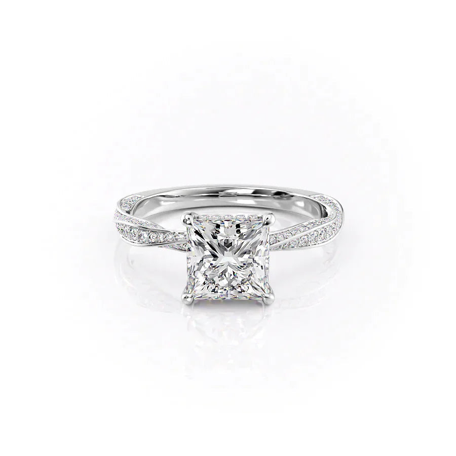 The Caroline. A White Gold Pave, Hidden Halo Engagement Ring Set With A 2ct Princess Lab Grown Diamond. White Background.
