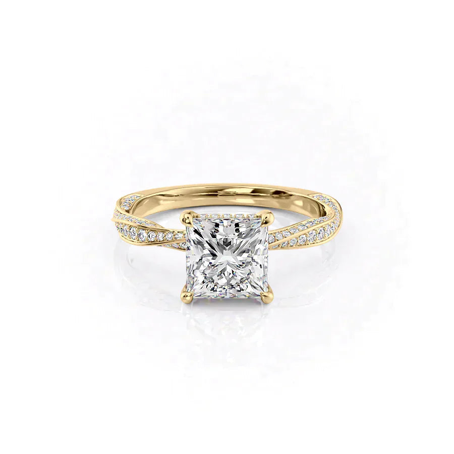 The Caroline. A Yellow Gold Pave, Hidden Halo Engagement Ring Set With A 2ct Princess Lab Grown Diamond. White Background.