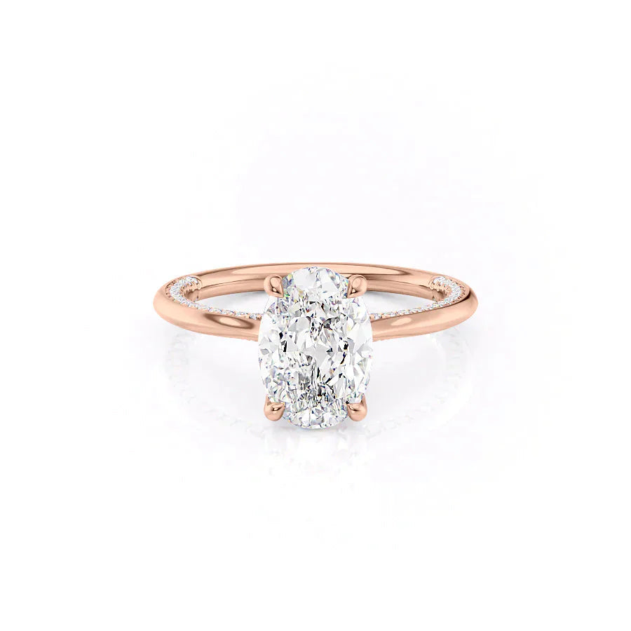 The Claire. A Rose Gold Solitaire, Pave Engagement Ring Set With A 2ct Oval Lab Grown Diamond. White Background.