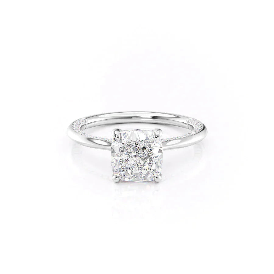 The Claire. A White Gold Solitaire, Pave Engagement Ring Set With A 2ct Cushion Lab Grown Diamond. White Background.