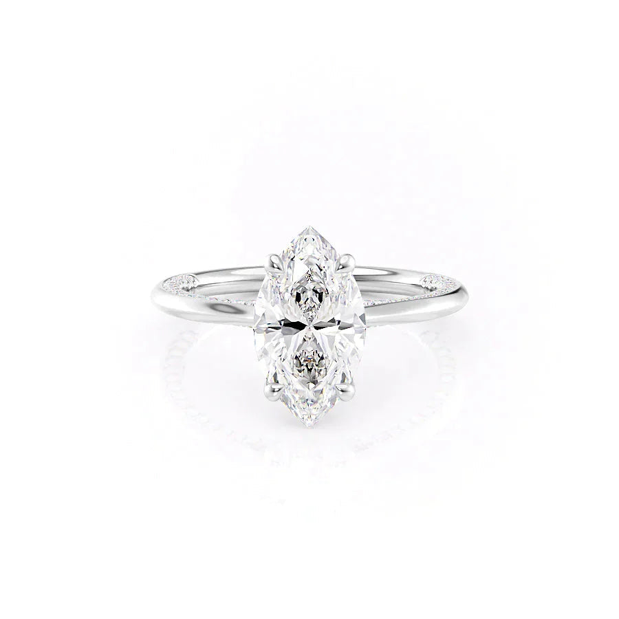 The Claire. A White Gold Solitaire, Pave Engagement Ring Set With A 2ct Marquise Lab Grown Diamond. White Background.